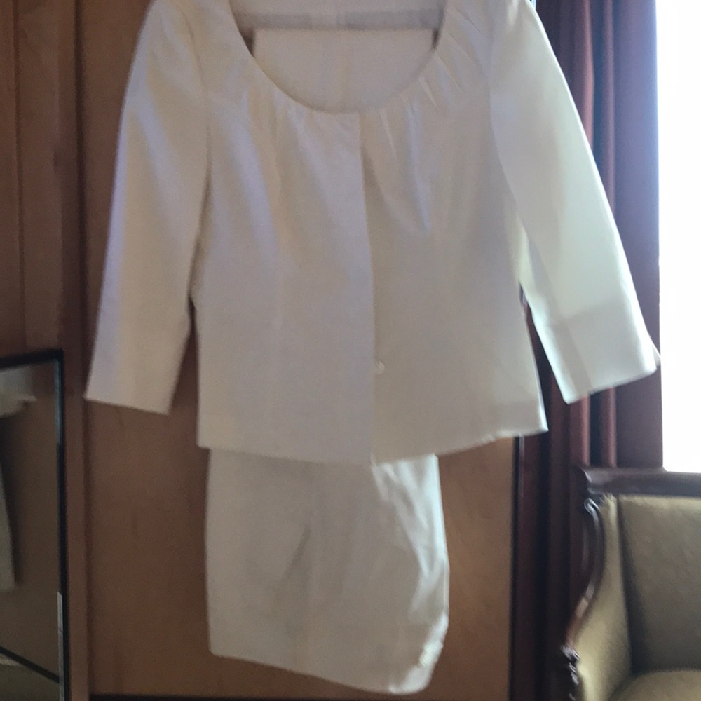 Escada white pantsuits.